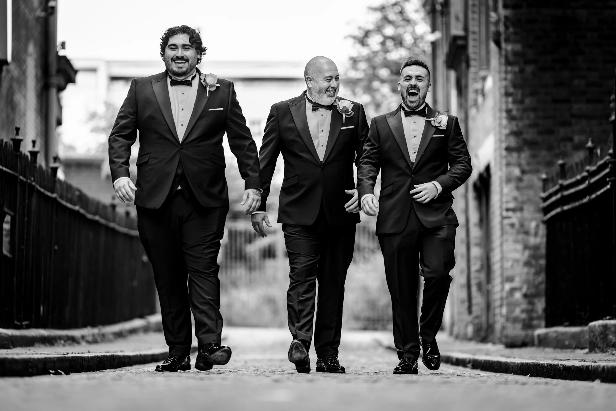 Groom and wedding party walking outside One Fine Day Liverpool