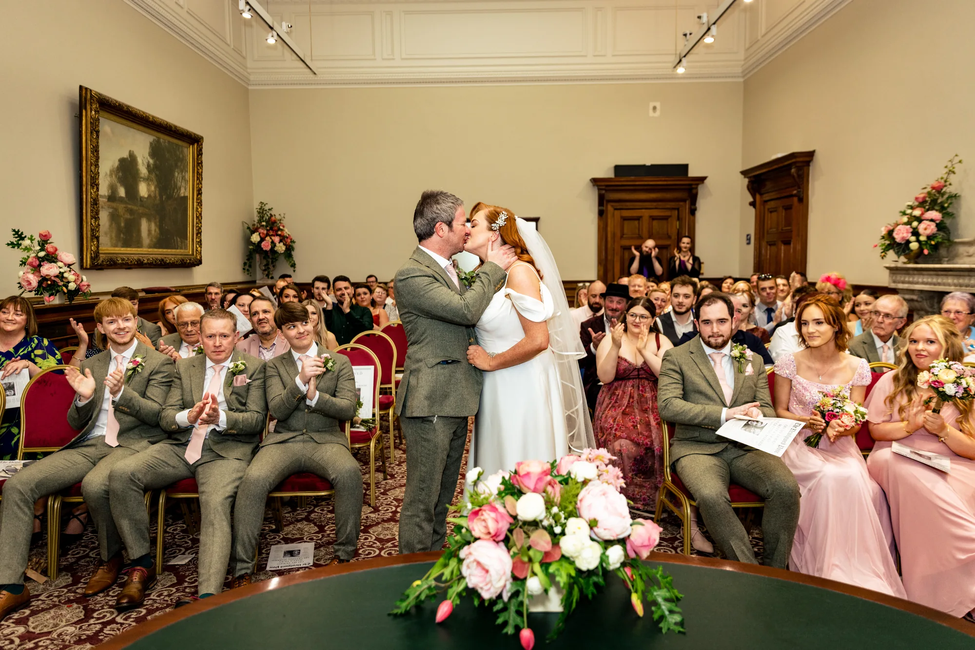 Couple kiss during their wedding ceremony at St George's Hall Liverpool